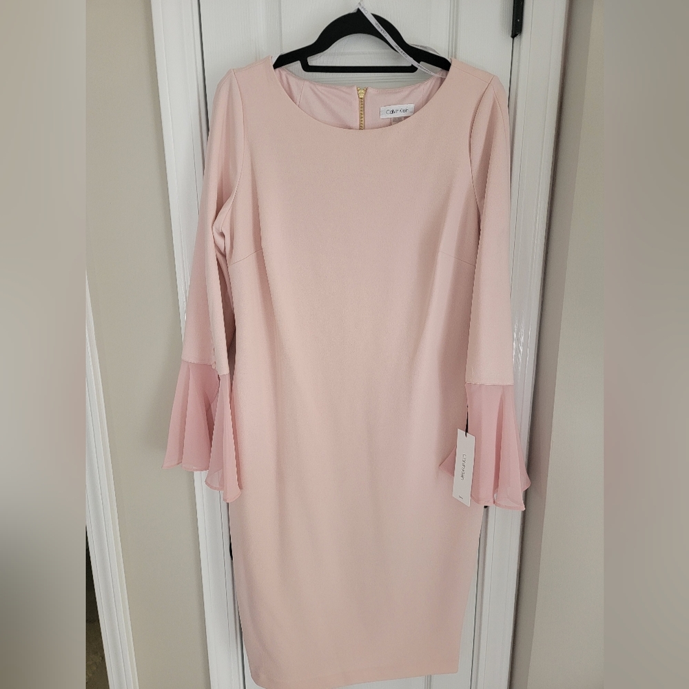 Pink dress with embellished sleeves